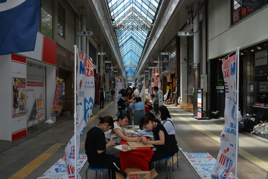8月街市での実践活動の写真